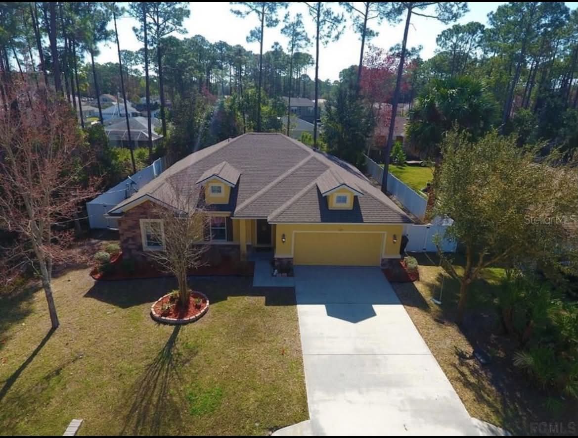 4-Bedroom Owner Finance Home in Palm Coast, FL in Palm Coast, FL, owner financed with no credit check, photo 1 of 8